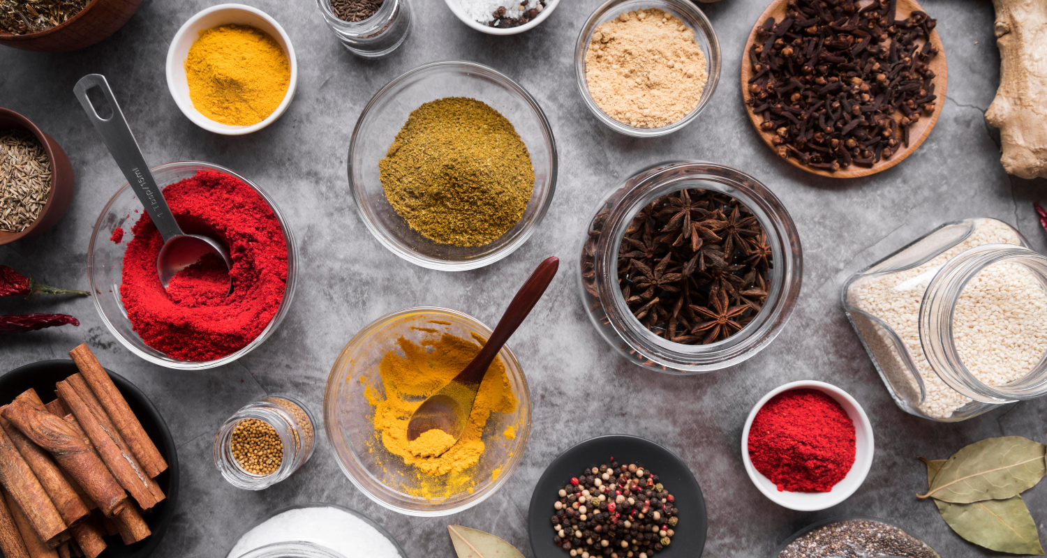 Various spices arranged in bowls, illustrating the exploration of different spice blends.