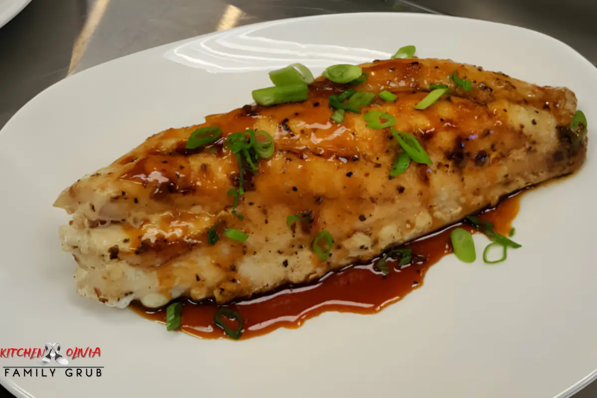 Contemporary plating of Chicken Souse with artistic garnish