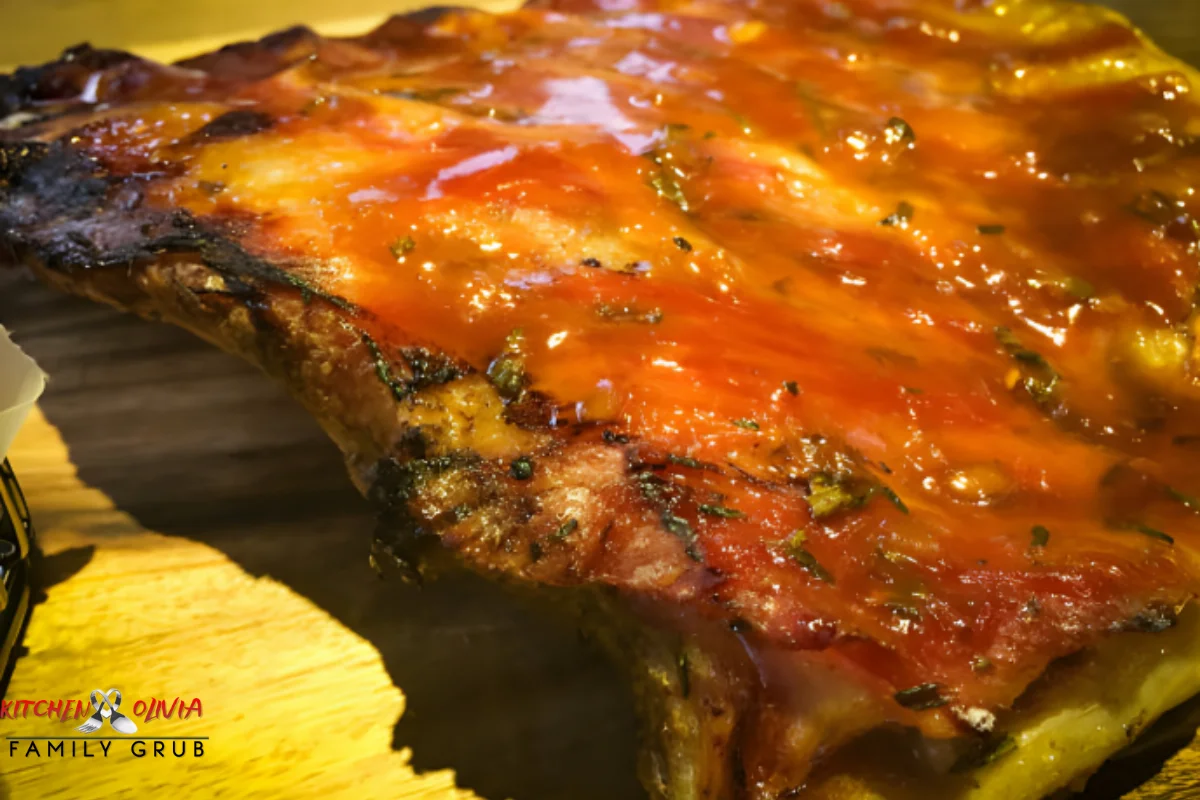 Close-up of a juicy smoked meatloaf showing texture