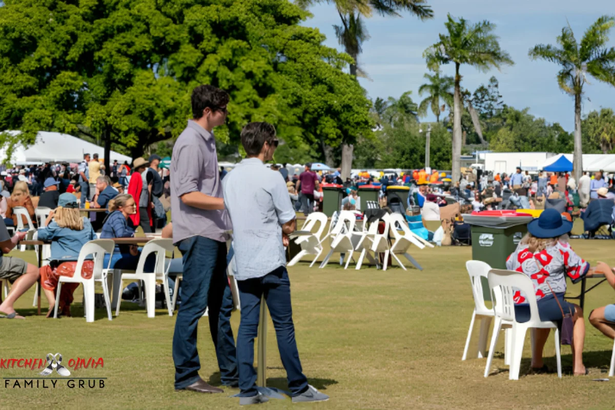 Crowd at a food festival enjoying fried chicken ice cream