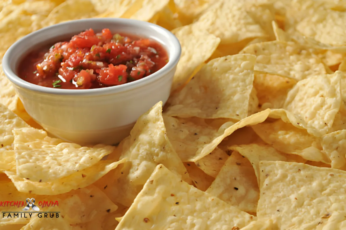 Creamy savory dip served with chips and fresh vegetables