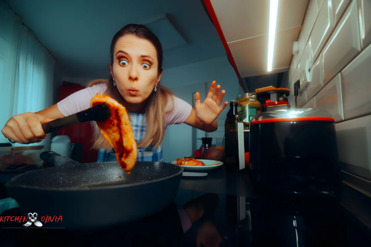 Crispy chicken tenders being fried in a skillet