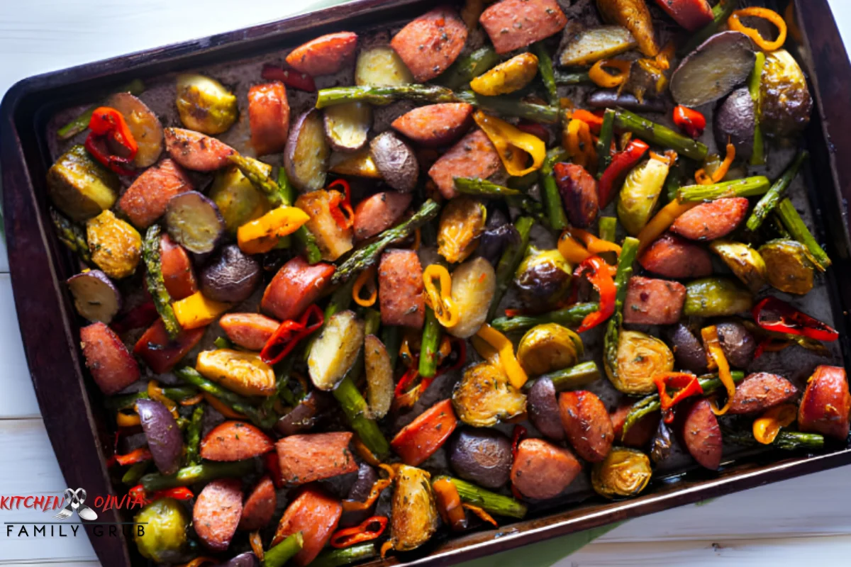 Oven-roasted vegetables seasoned with herbs on a baking sheet