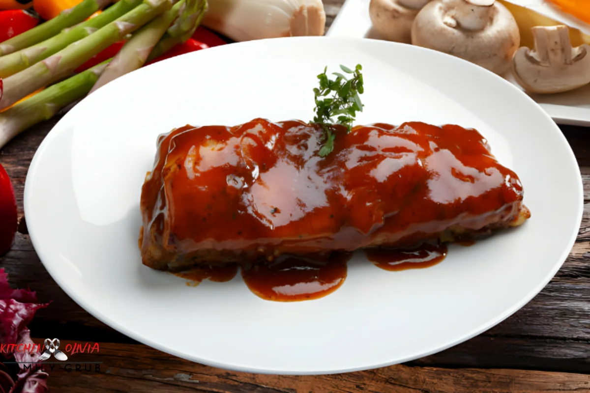 Applying barbecue sauce on meatloaf