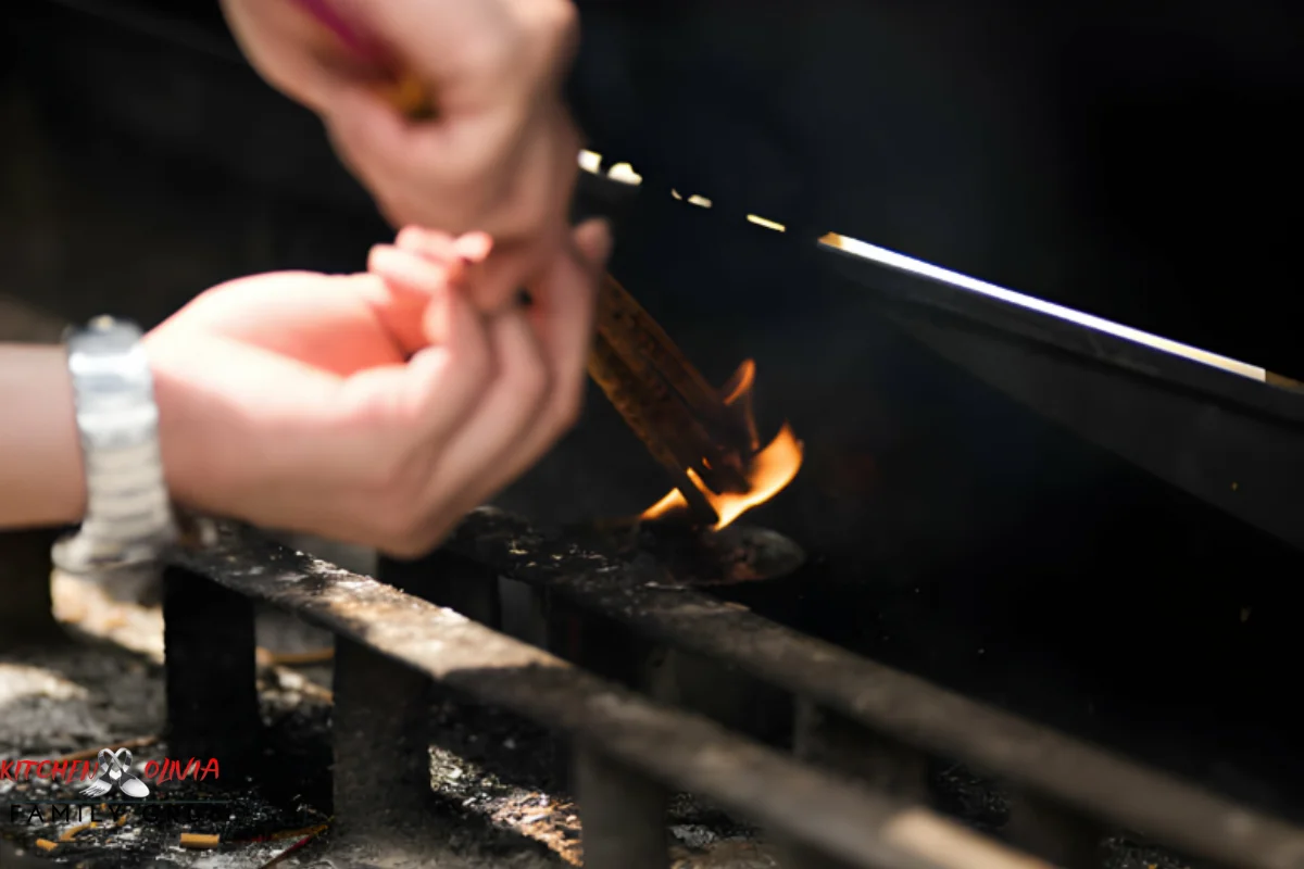 Chef choosing wood for smoking meat